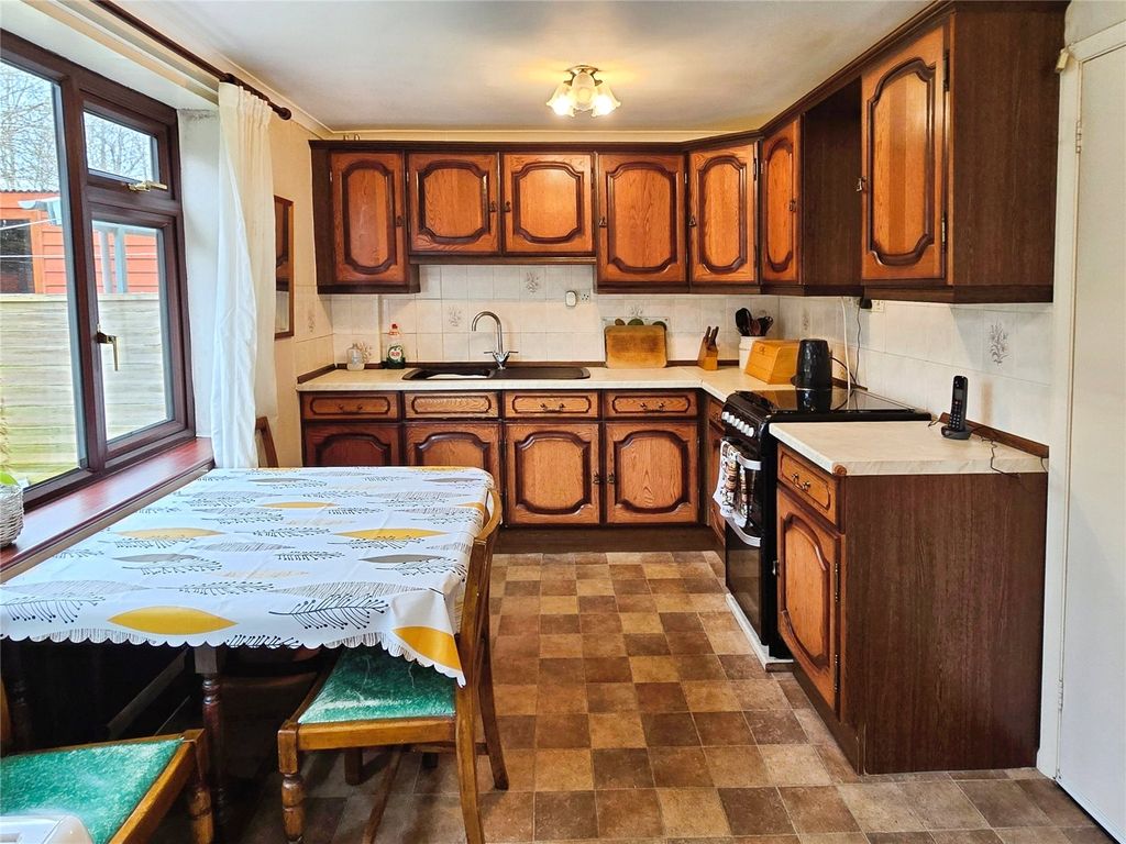 Property photo 3 of 13 Dining Kitchen