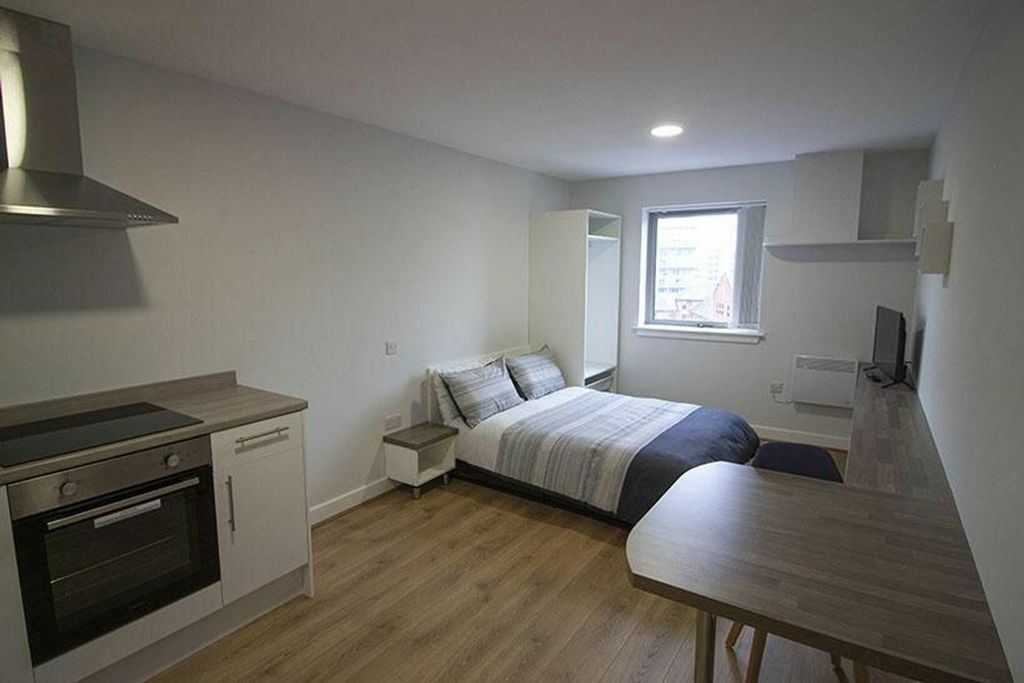 Property photo 1 of 4 This Stylish Double Bedroom Features Ample Natural...