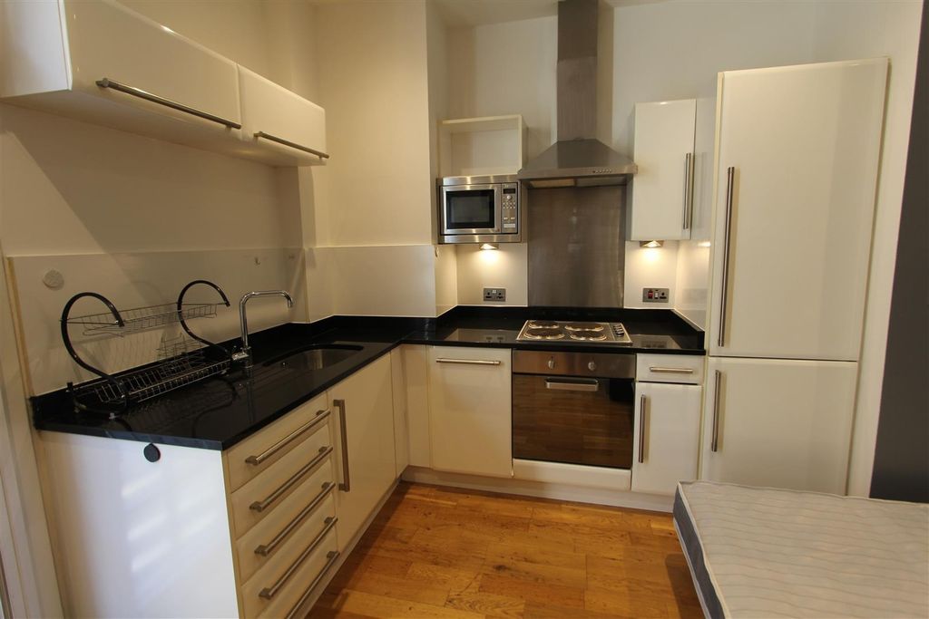 Property photo 2 of 7 Modern Kitchen With Sleek Gloss Cabinetry...