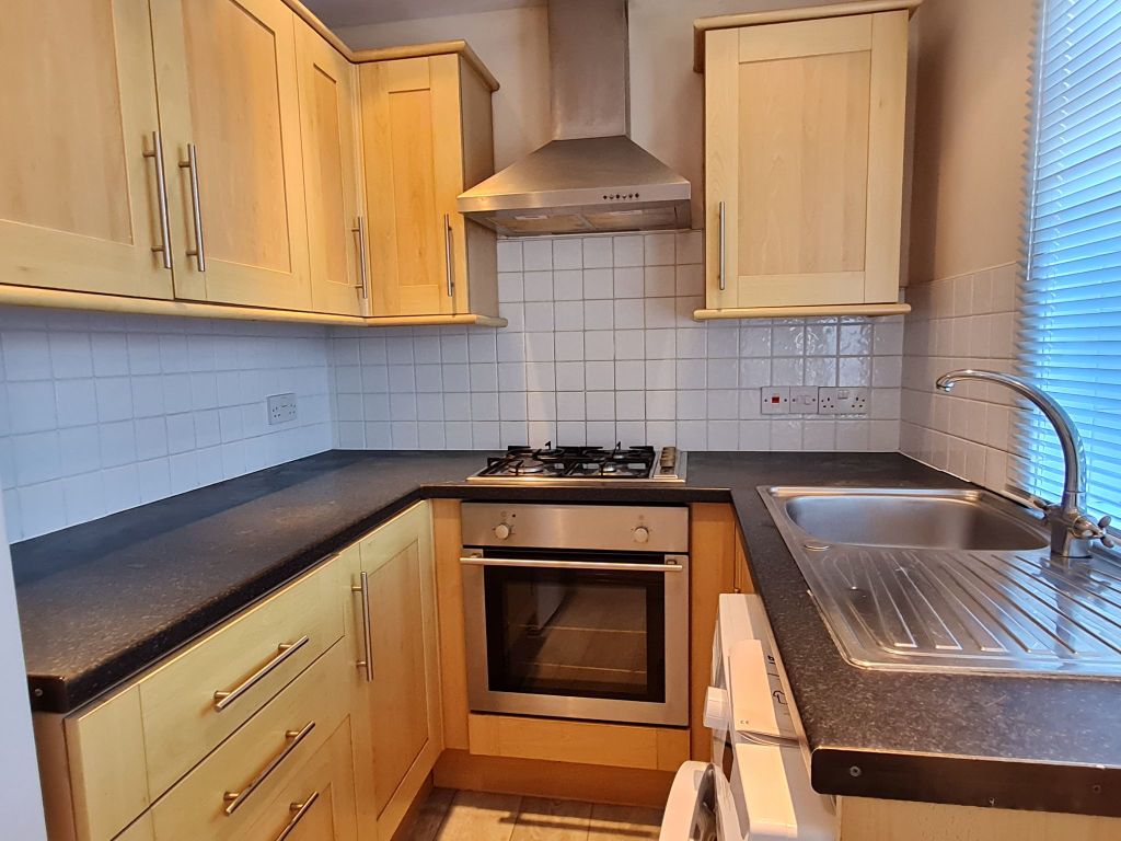 Property photo 3 of 9 Kitchen