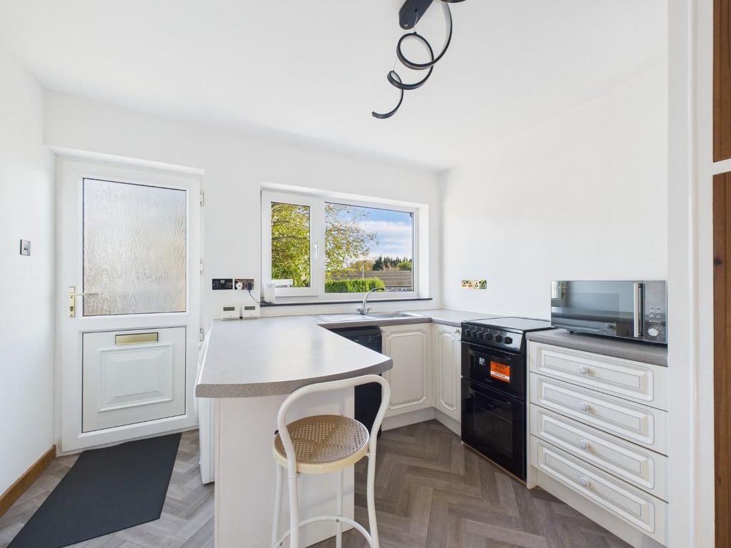 Property photo 2 of 12 Kitchen