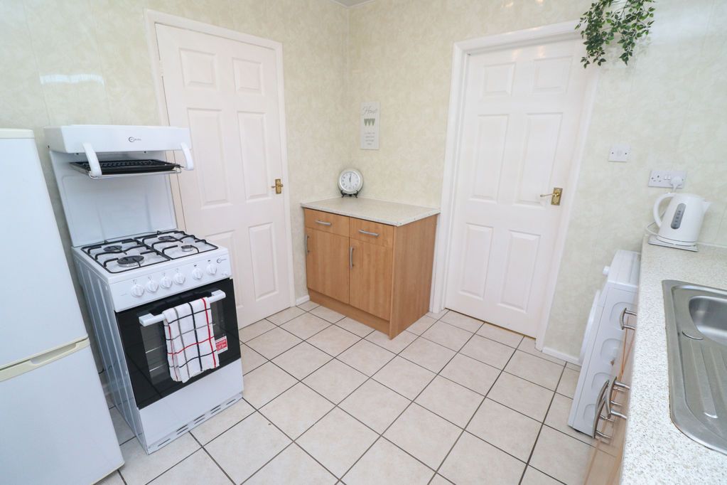 Property photo 3 of 13 Kitchen