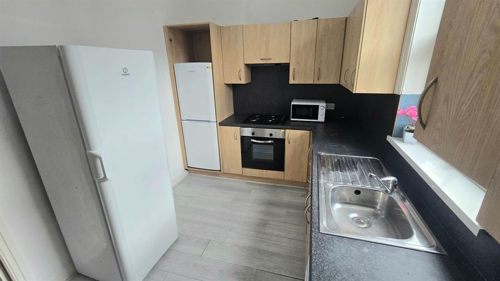 Property photo 2 of 11 Bright Modern Kitchen With Wood-Effect Cabinets, i...