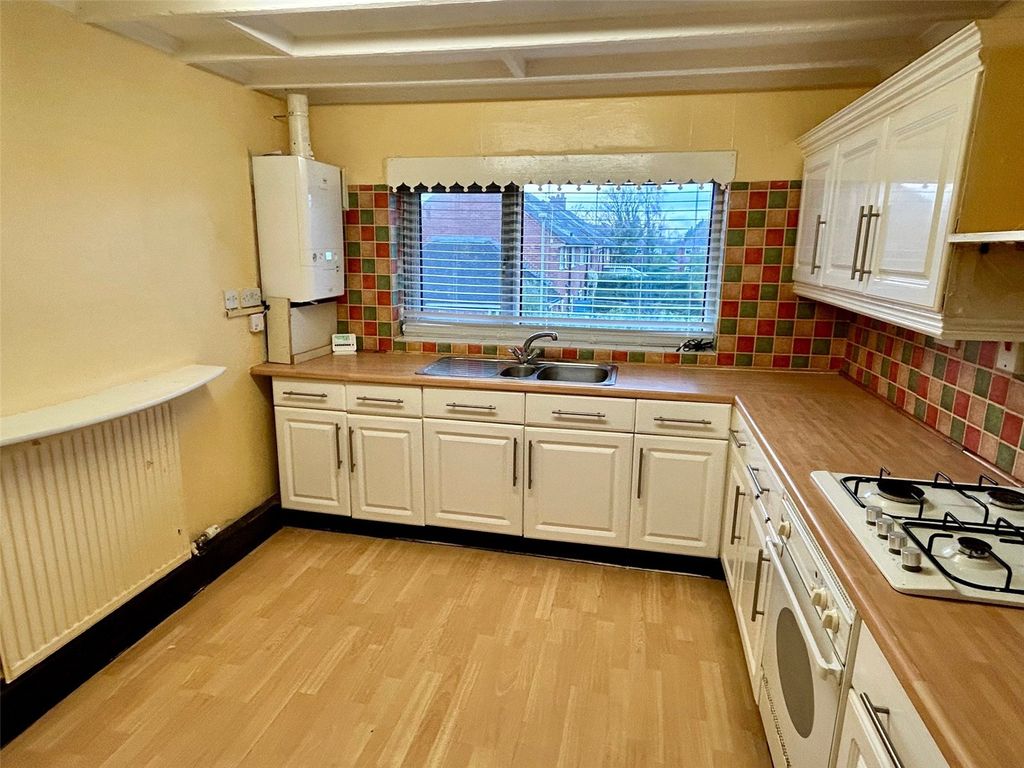 Property photo 3 of 12 Kitchen