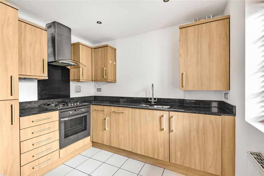 Property photo 3 of 8 Kitchen