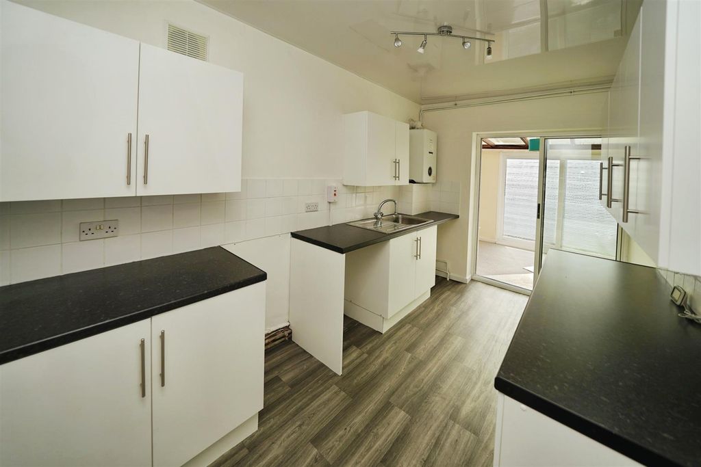 Property photo 2 of 12 Kitchen