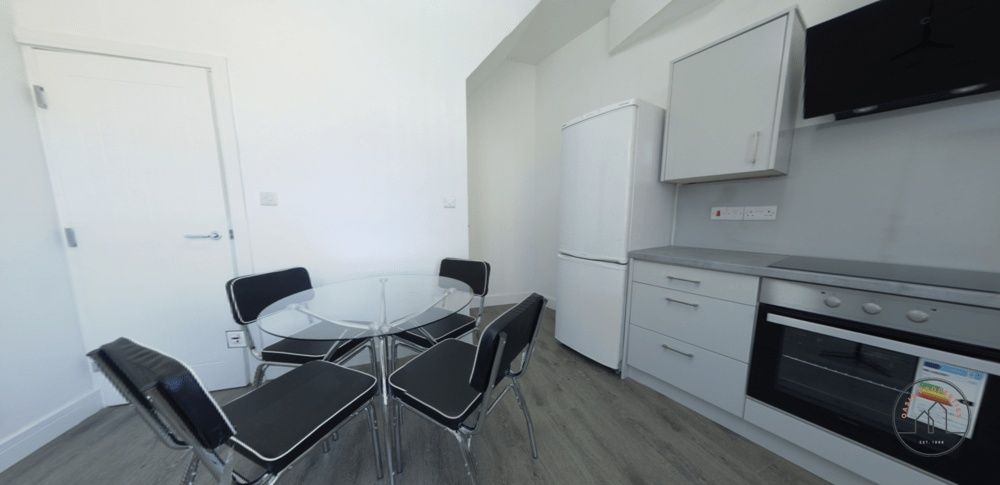 Property photo 1 of 15 A Bright And Modern Living Room Featuring Contempo...