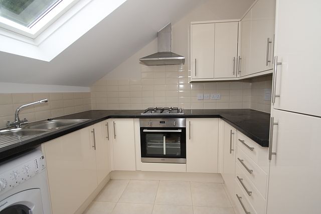 Property photo 3 of 6 Kitchen