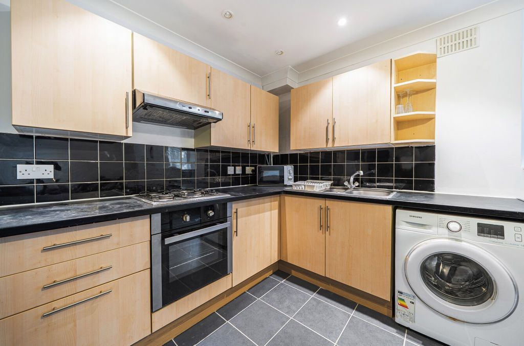 Property photo 3 of 12 Kitchen