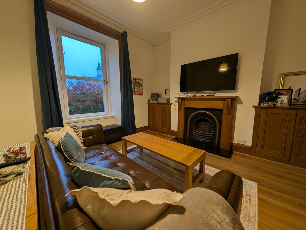 Property photo 3 of 12 Living Room