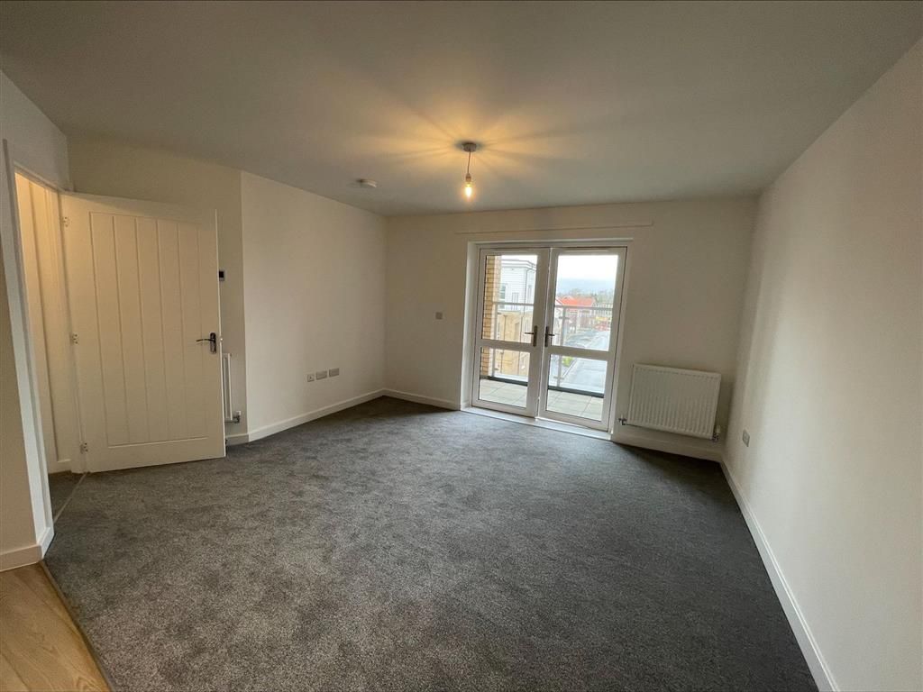 Property photo 2 of 11 Living Area