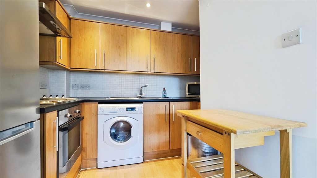 Property photo 3 of 9 Kitchen
