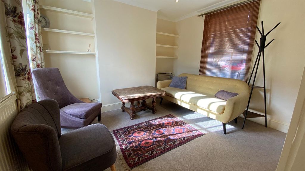 Property photo 1 of 25 Bright Living Area With Stylish Alcove Shelving...