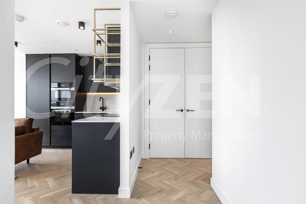 Property photo 3 of 26 Hallway/Kitchen