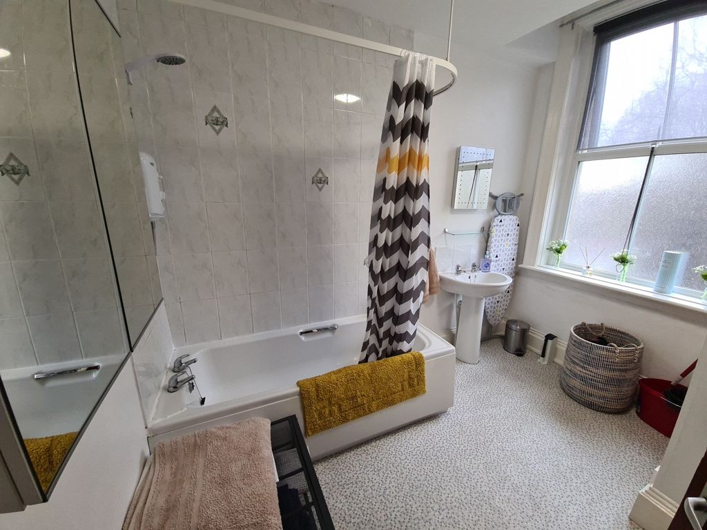 Property photo 2 of 11 Bright, Well-Kept Bathroom With A Full Bath And Sh...