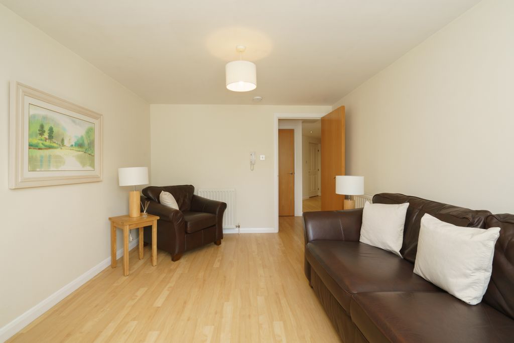 Property photo 3 of 10 2. Living Room Angle 2