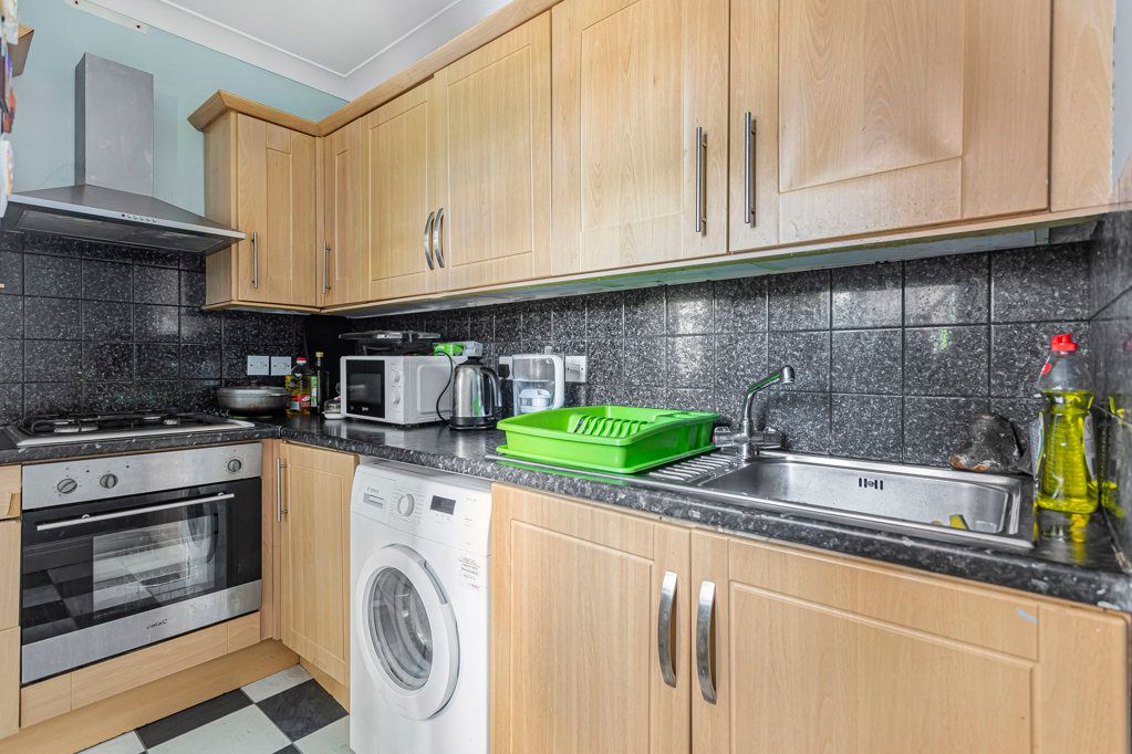 Property photo 3 of 12 Kitchen