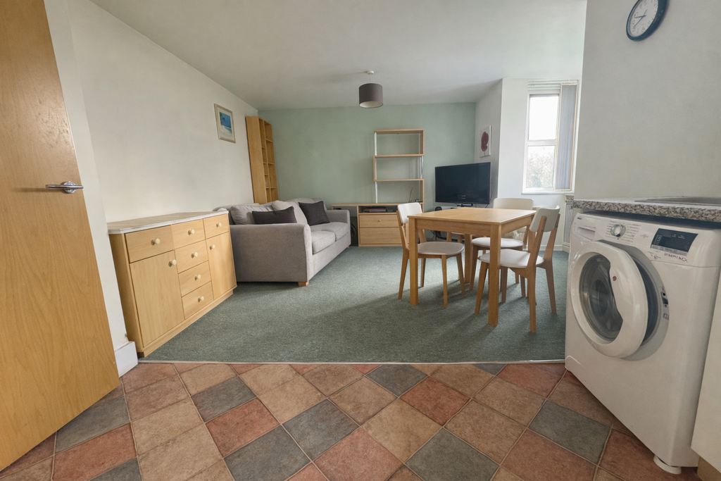 Property photo 2 of 9 Kitchen/Living Area