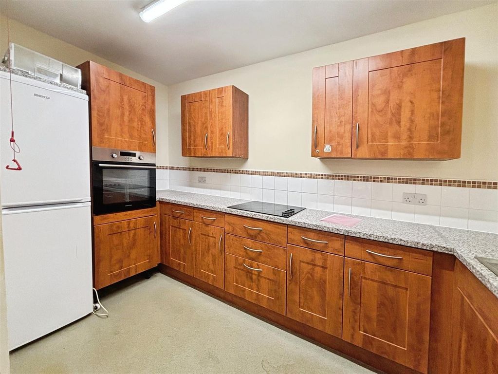 Property photo 2 of 12 Kitchen