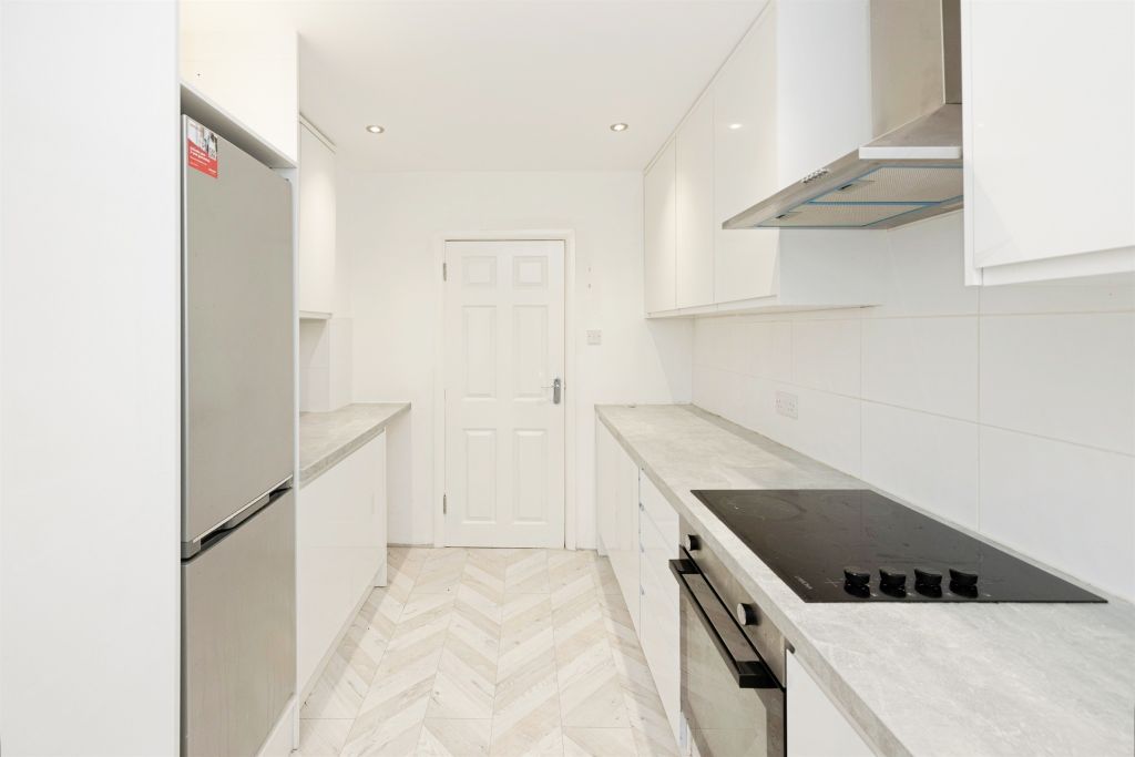 Property photo 3 of 12 Kitchen