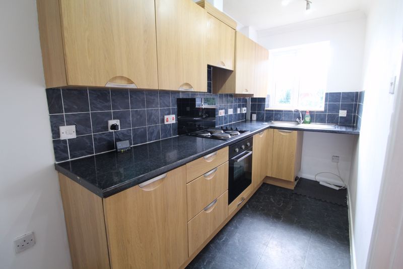 Property photo 3 of 8 Kitchen