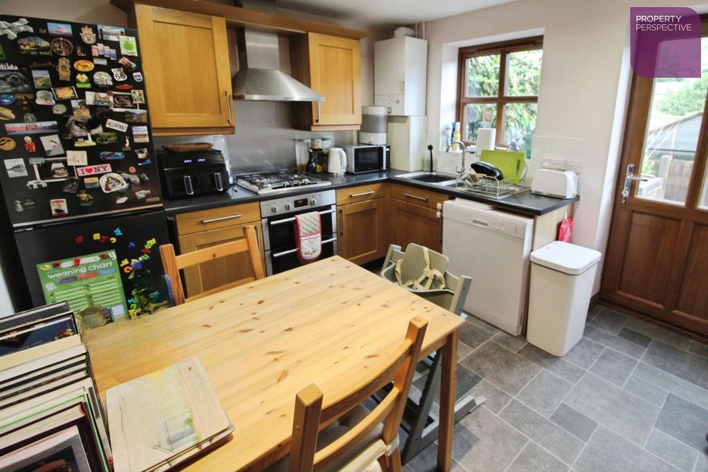 Property photo 3 of 11 Dining Kitchen