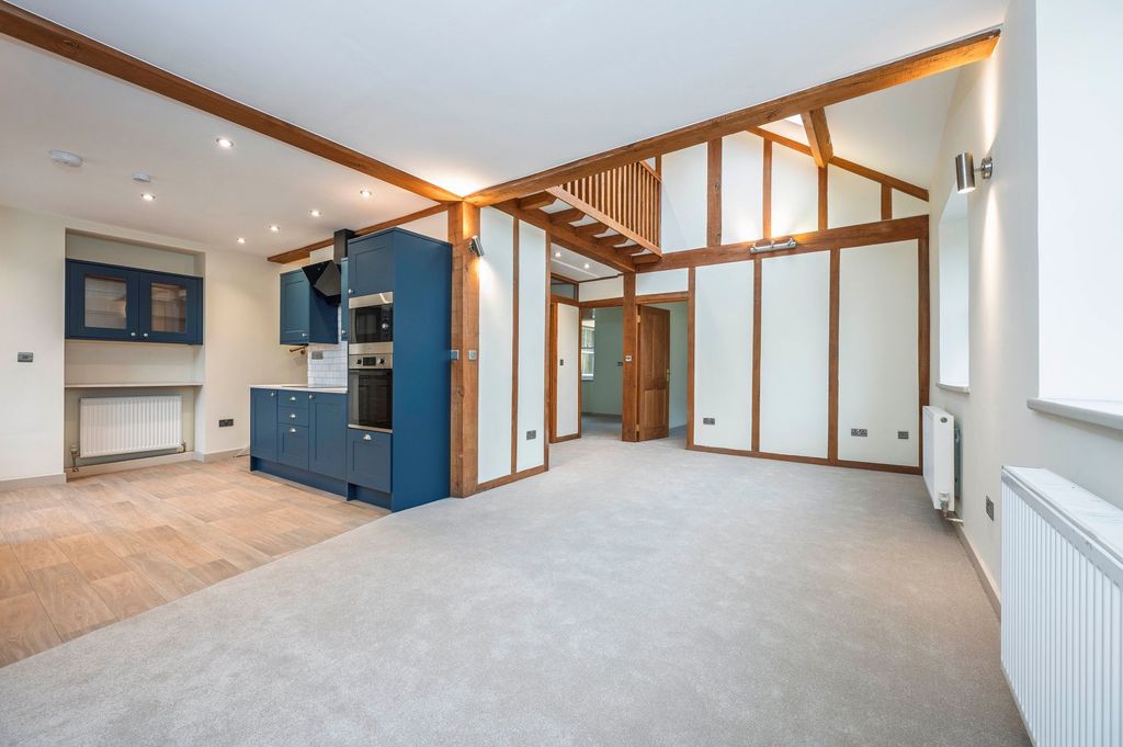 Property photo 2 of 16 Kitchen & Living Space