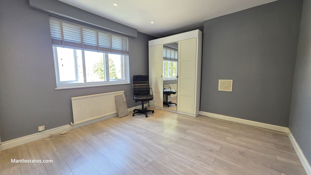 Property photo 3 of 19 Front Bedroom