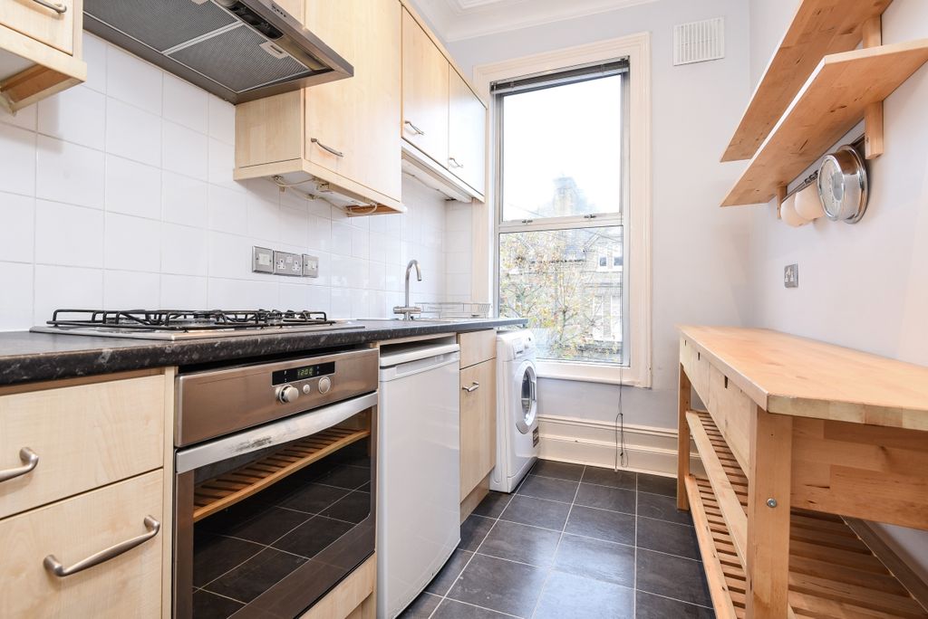 Property photo 3 of 8 Kitchen