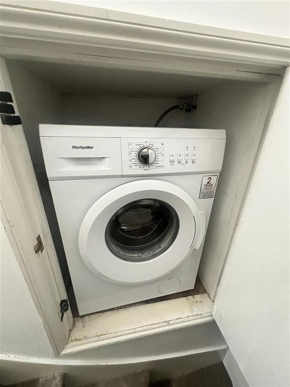 Property photo 2 of 8 Convenient Laundry Area With Modern Appliances...