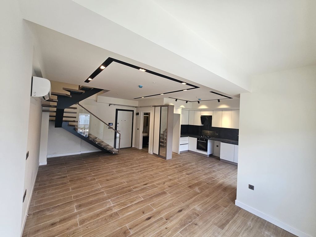 Property photo 3 of 14 Tasteful Newly-Built Antalya Property For Sale Near The Beach - Modern Open-Plan Lounge And Kitchen