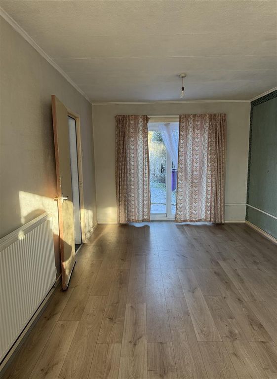 Property photo 3 of 8 Living Room.Jpeg