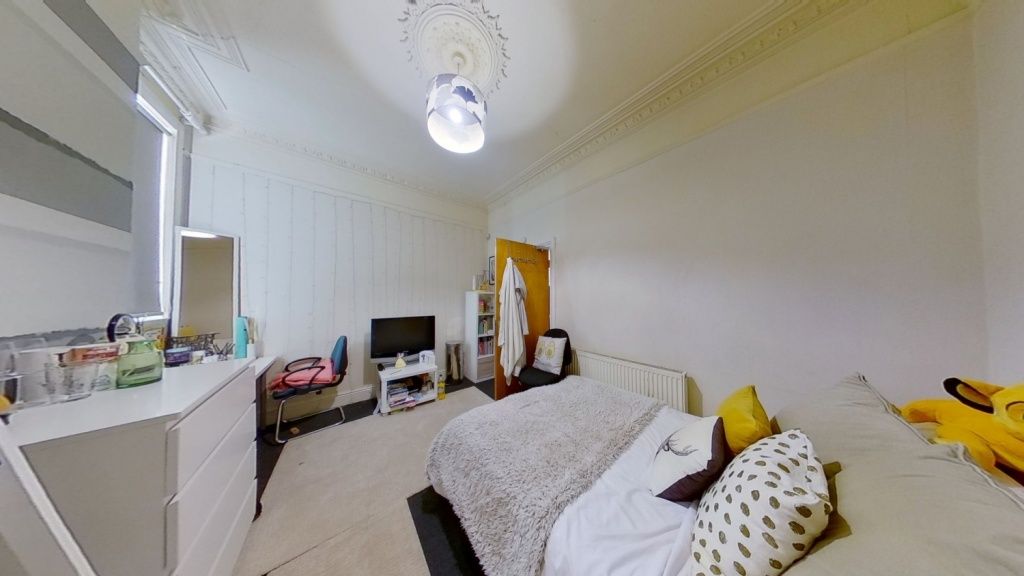Property photo 3 of 11 Bright And Inviting Master Bedroom Featuring A Com...