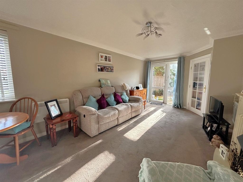 Property photo 2 of 12 Living