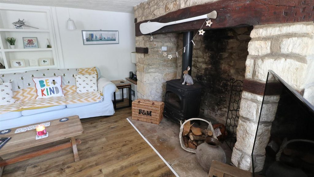 Property photo 3 of 11 Fireplace