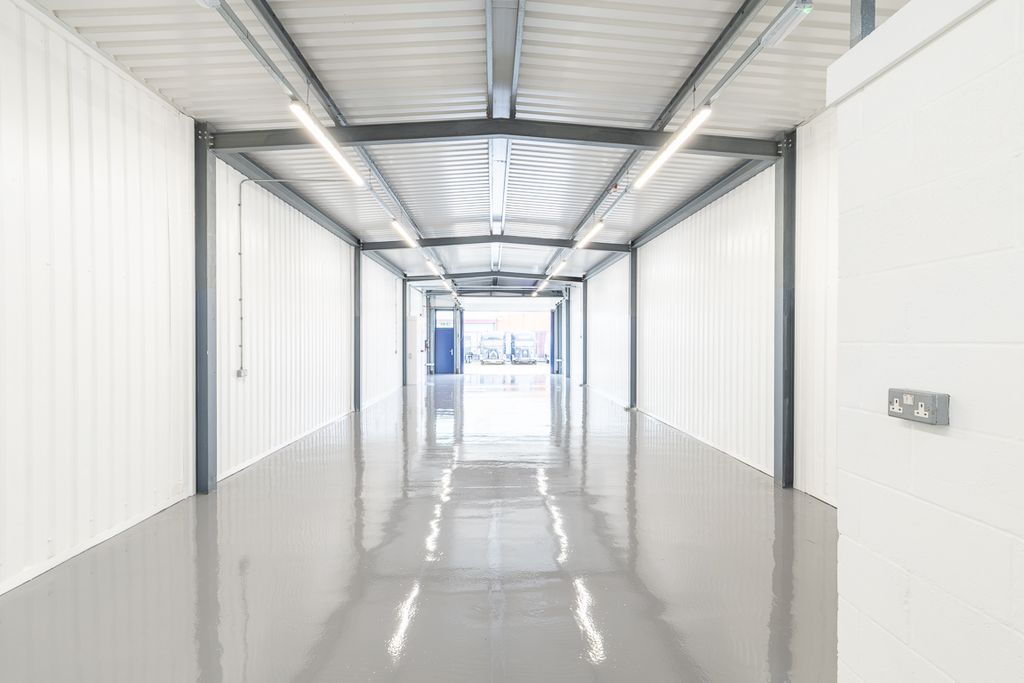 Property photo 3 of 4 An Empty Arch With White Lining, Facing The Front Electric Roller Shutter Entrance, Which Is Open.