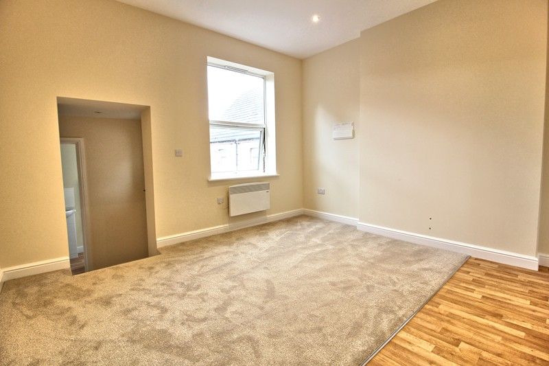 Property photo 2 of 8 Living Area