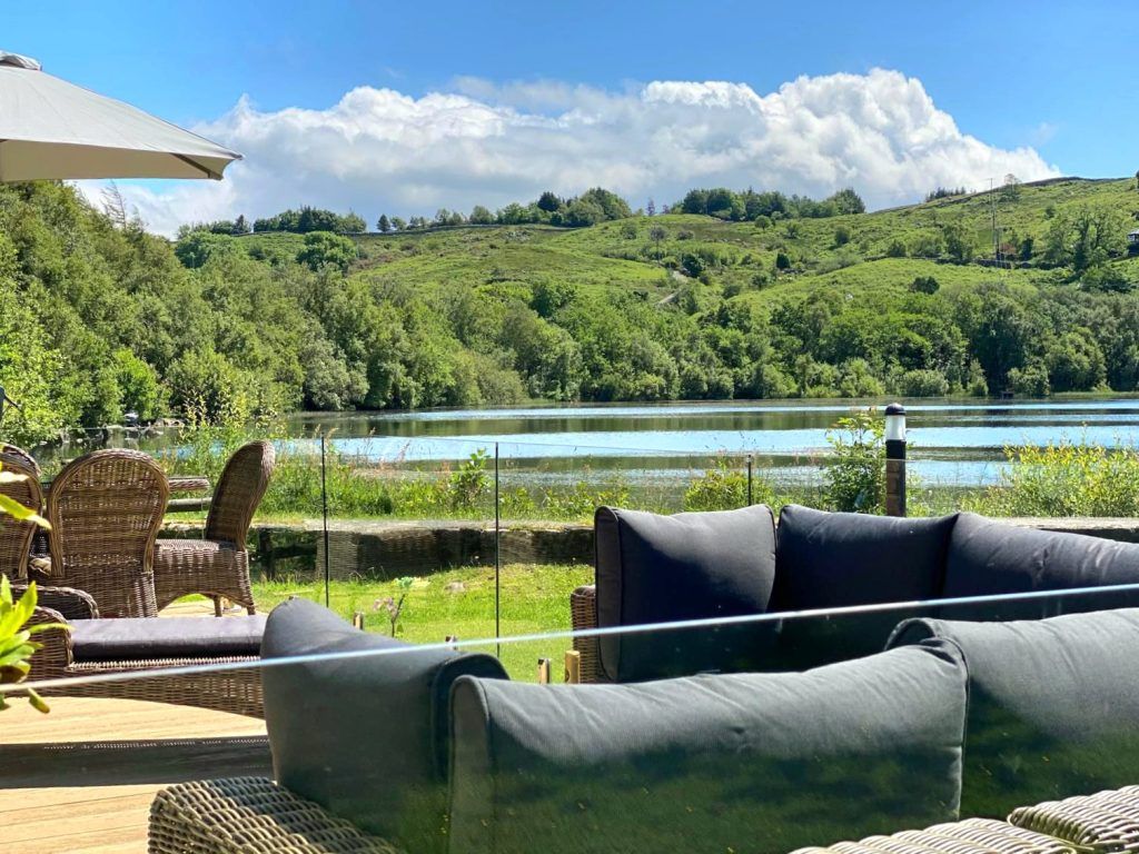 Property photo 3 of 21 Private Decking Area Overlooking The Lake And Countryside At Brynteg Holiday Park.