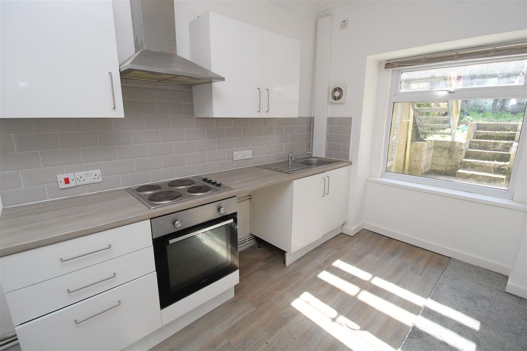 Property photo 2 of 9 Modern Bright Kitchen With Sleek White Cabinets...