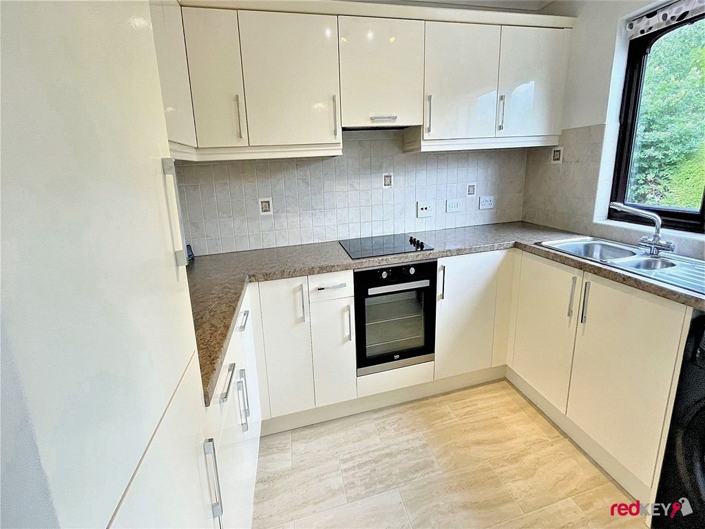 Property photo 3 of 7 Kitchen