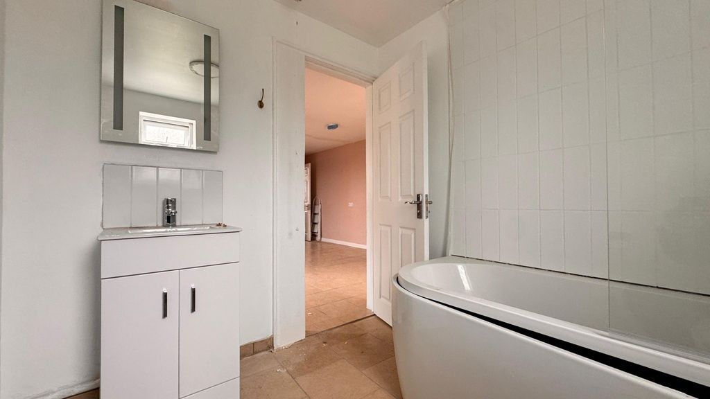 Property photo 2 of 6 Bright Modern Bathroom With Freestanding Bath...