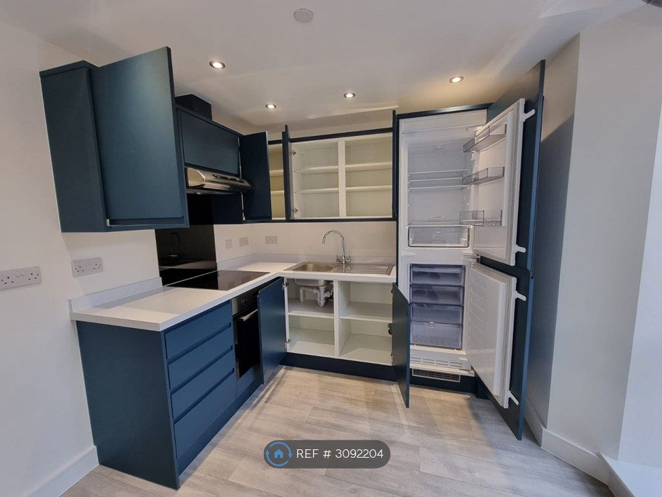Property photo 3 of 9 Kitchen With Shelves Opened