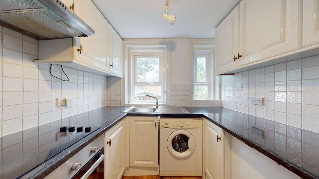 Property photo 3 of 7 Kitchen