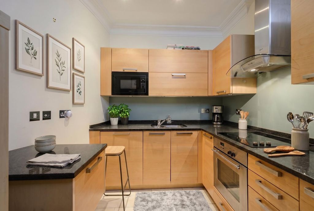 Property photo 3 of 13 Kitchen