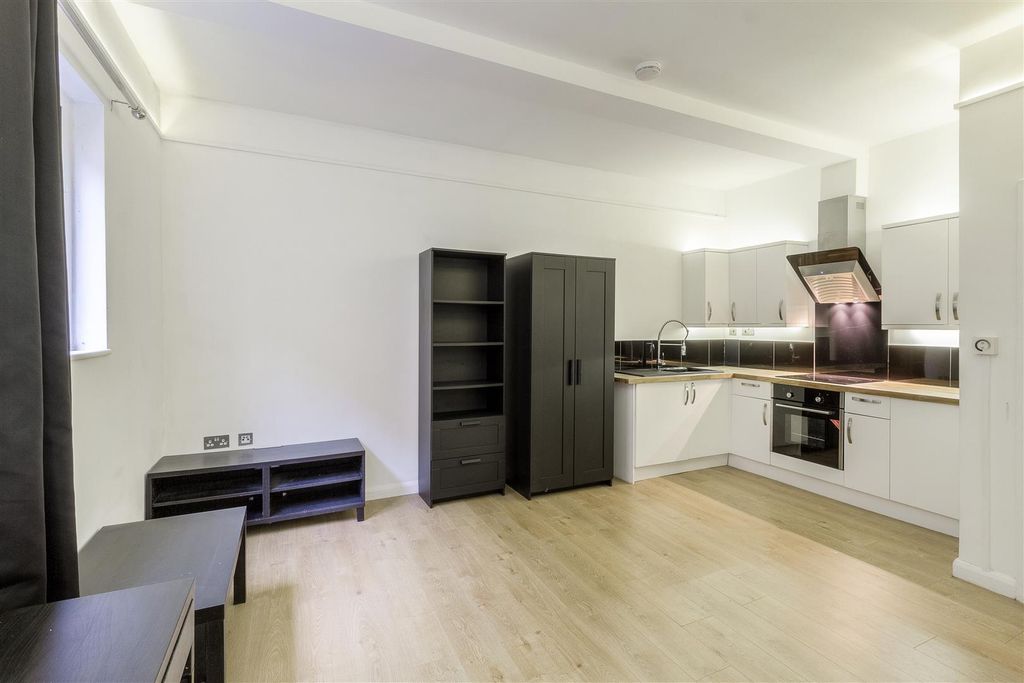 Property photo 3 of 8 Living Area