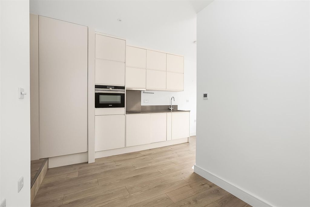 Property photo 3 of 12 Kitchen / Living Room
