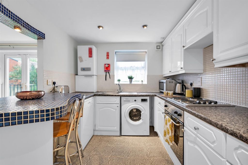 Property photo 2 of 5 Bright Fitted Kitchen With Breakfast Bar...