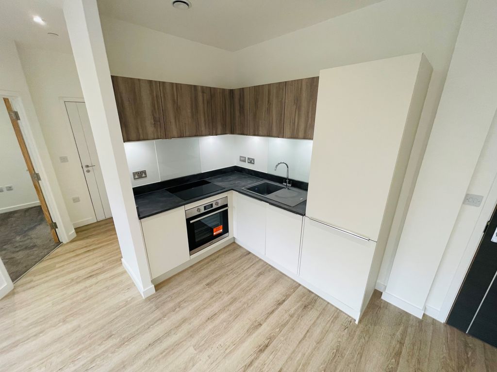 Property photo 2 of 6 Kitchen Area