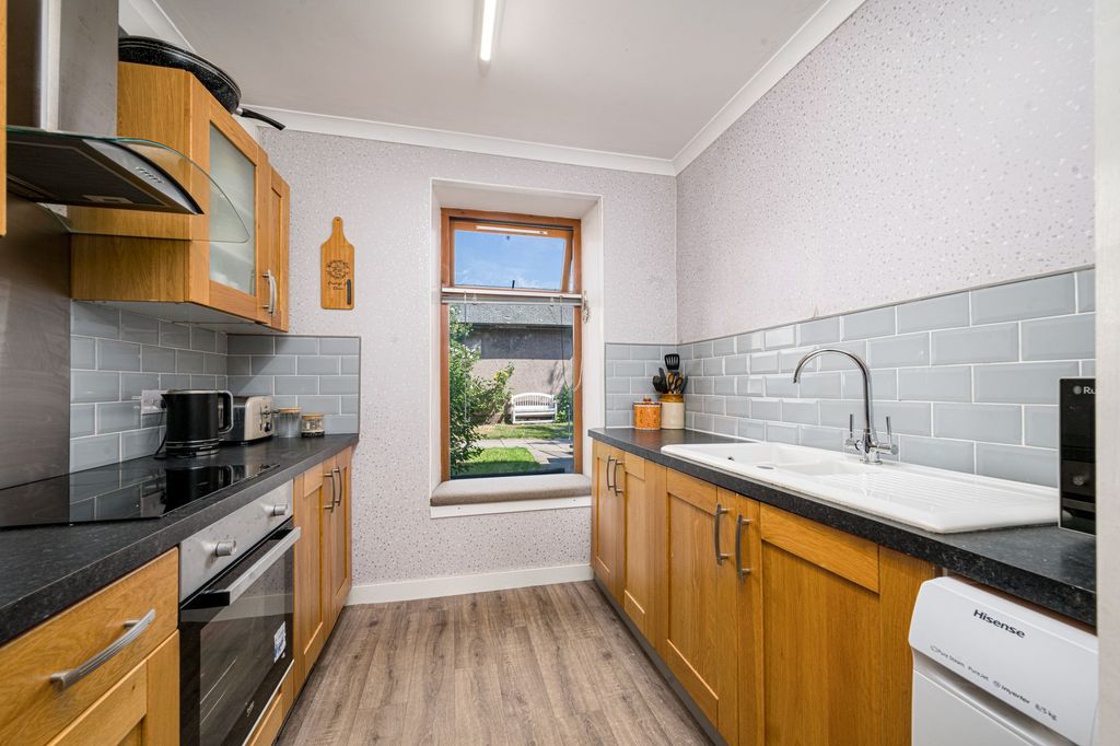 Property photo 3 of 12 Kitchen