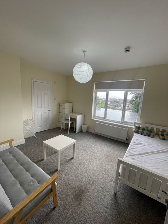 Property photo 3 of 12 Bright And Airy Double Bedroom Featuring A Large W...